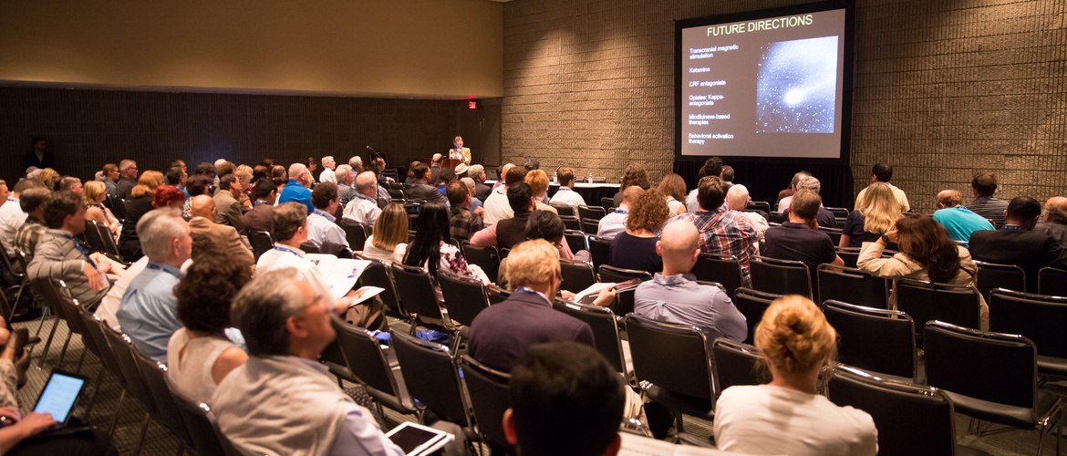 Attendees of a presentation about the merge of psychiatry with internal medicine.